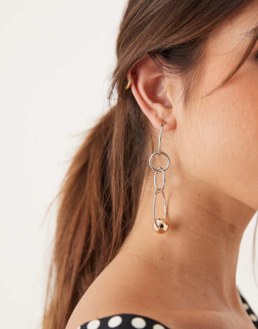 Drop circle earrings with gold-tone ball detail in silver tone