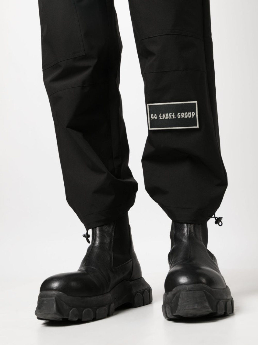 Logo-patch straight-leg trousers - Black