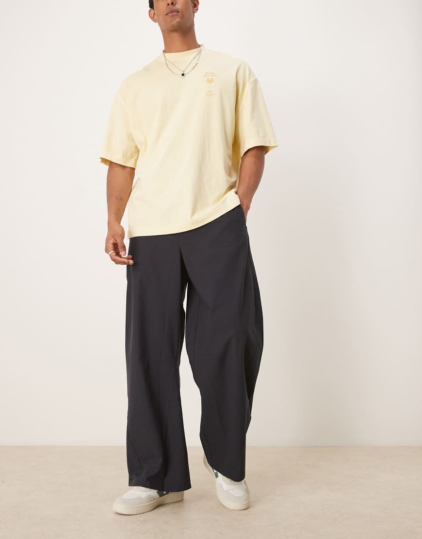 Twisted horseshoe pants in black