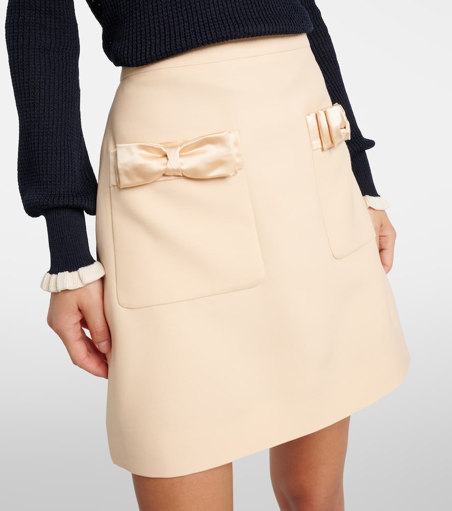 Crepe Couture bow-detail miniskirt