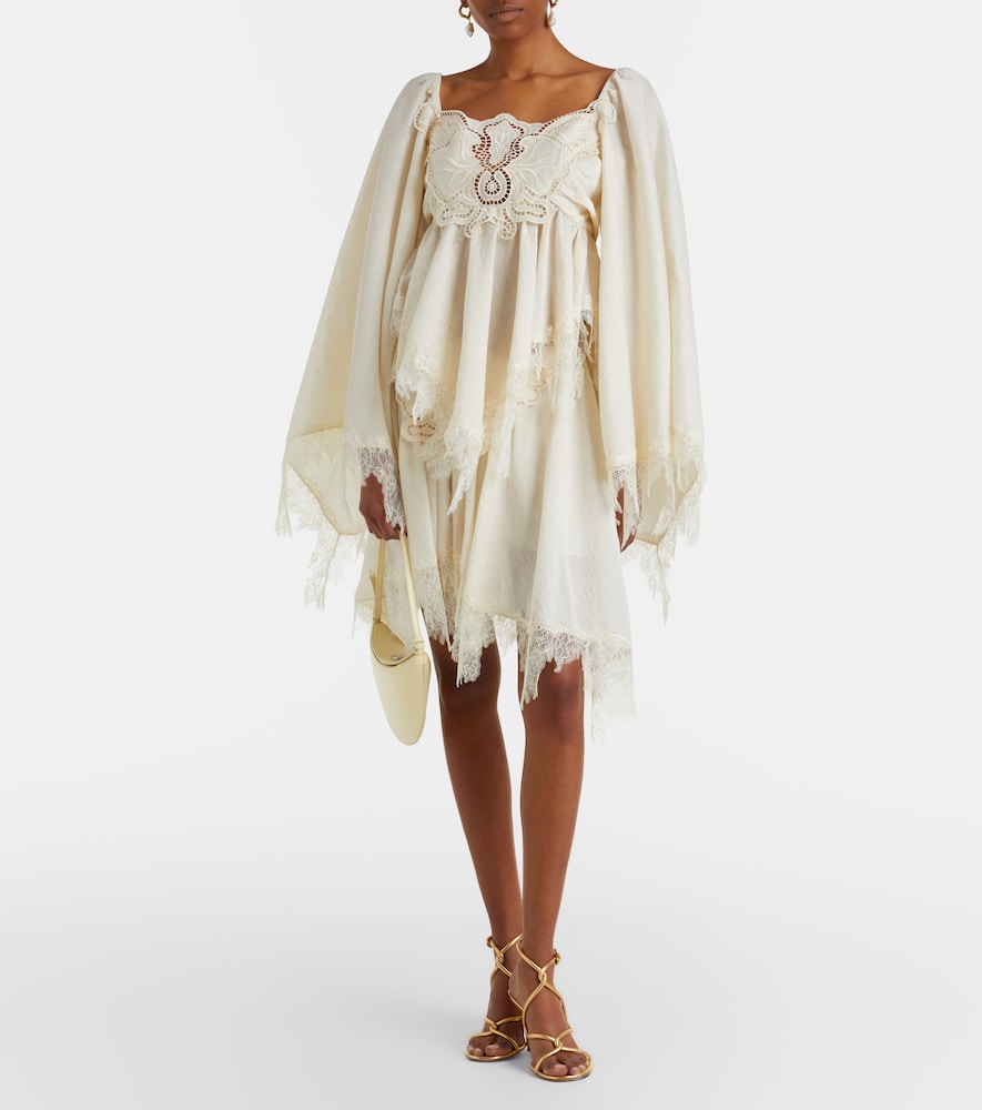Embroidered lace-trimmed blouse
