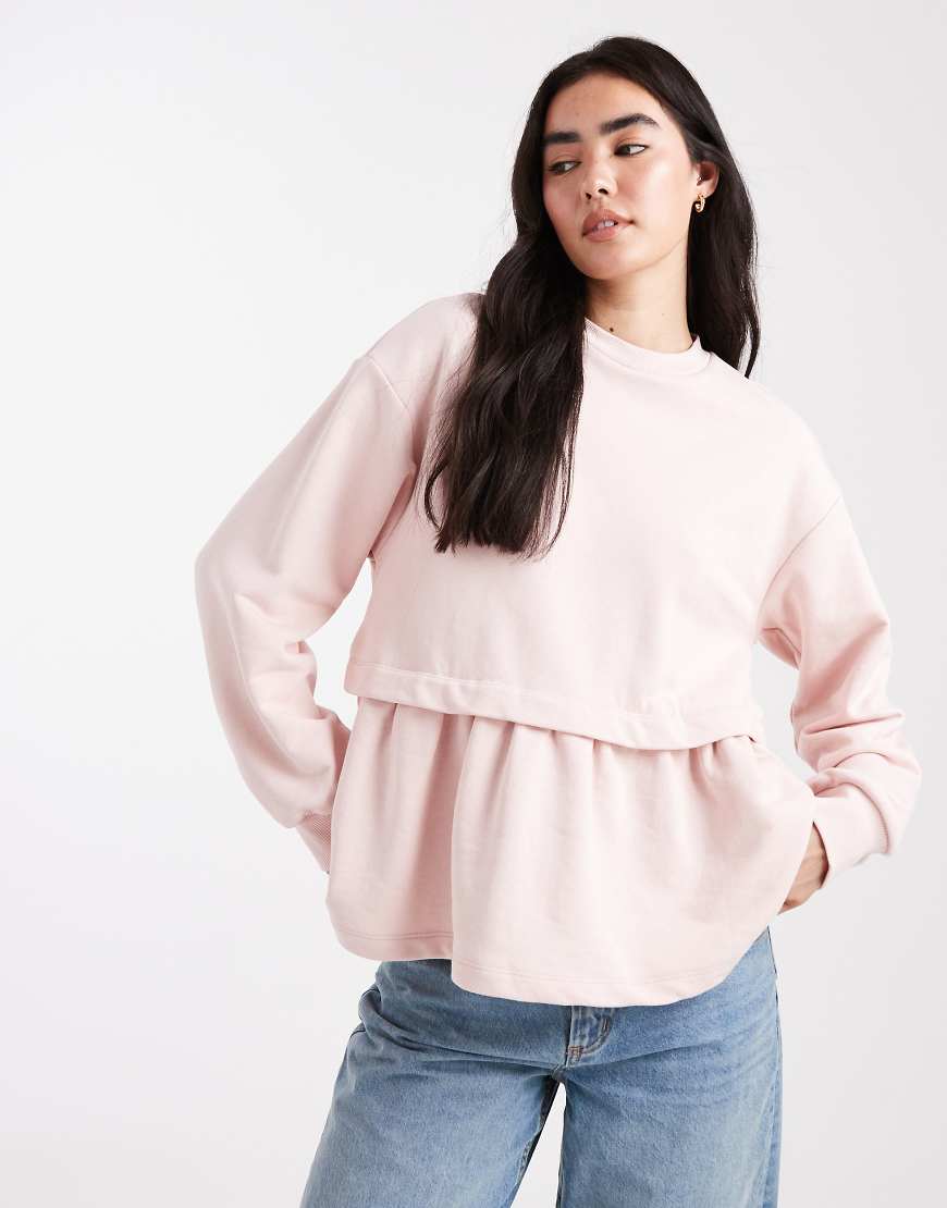 Peplum hem sweatshirt in pink