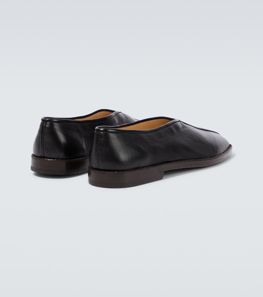 Piped leather loafers