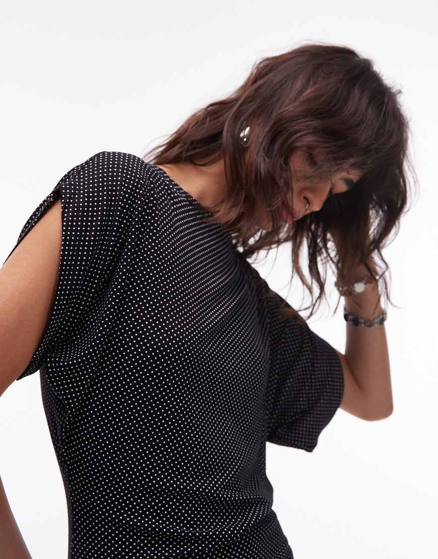 Polka dot slash neck batwing top in black