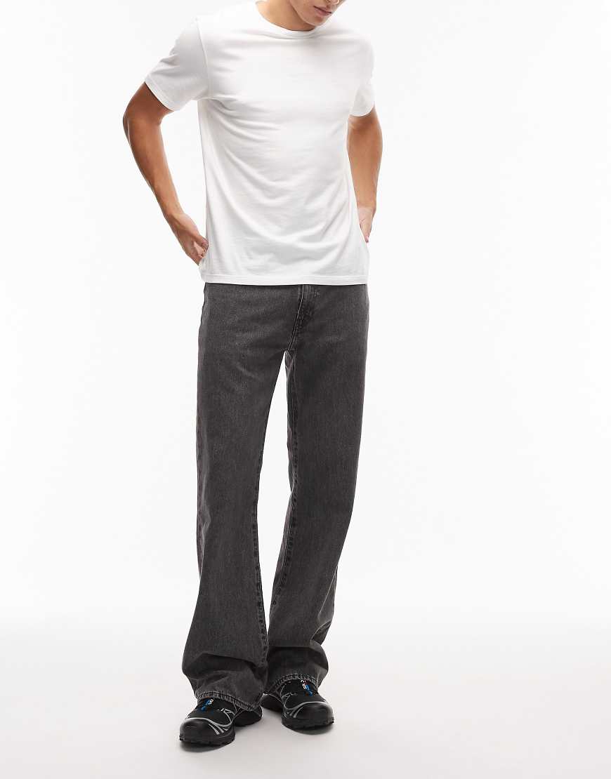 567 relaxed flare fit jeans in washed black