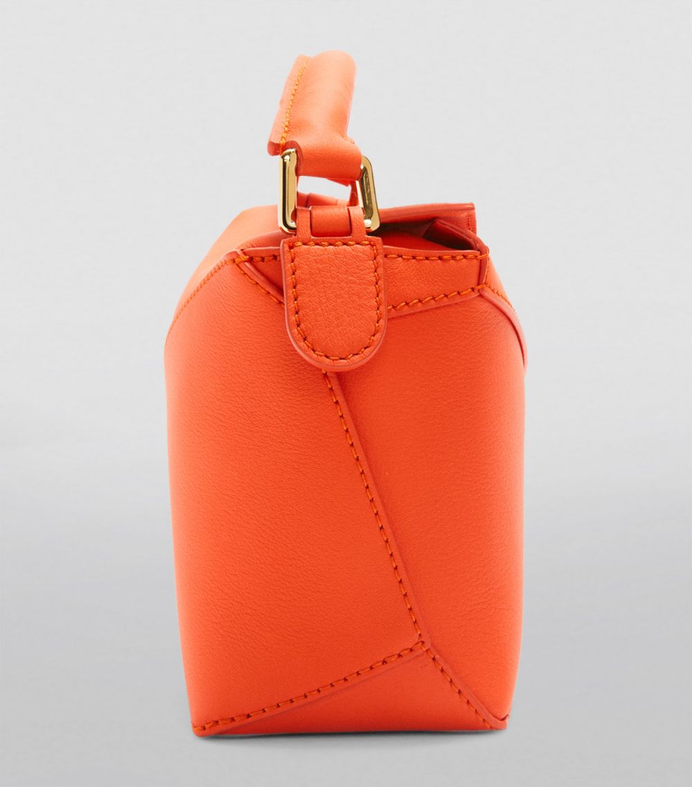 Mini Leather Puzzle Edge Top-Handle Bag