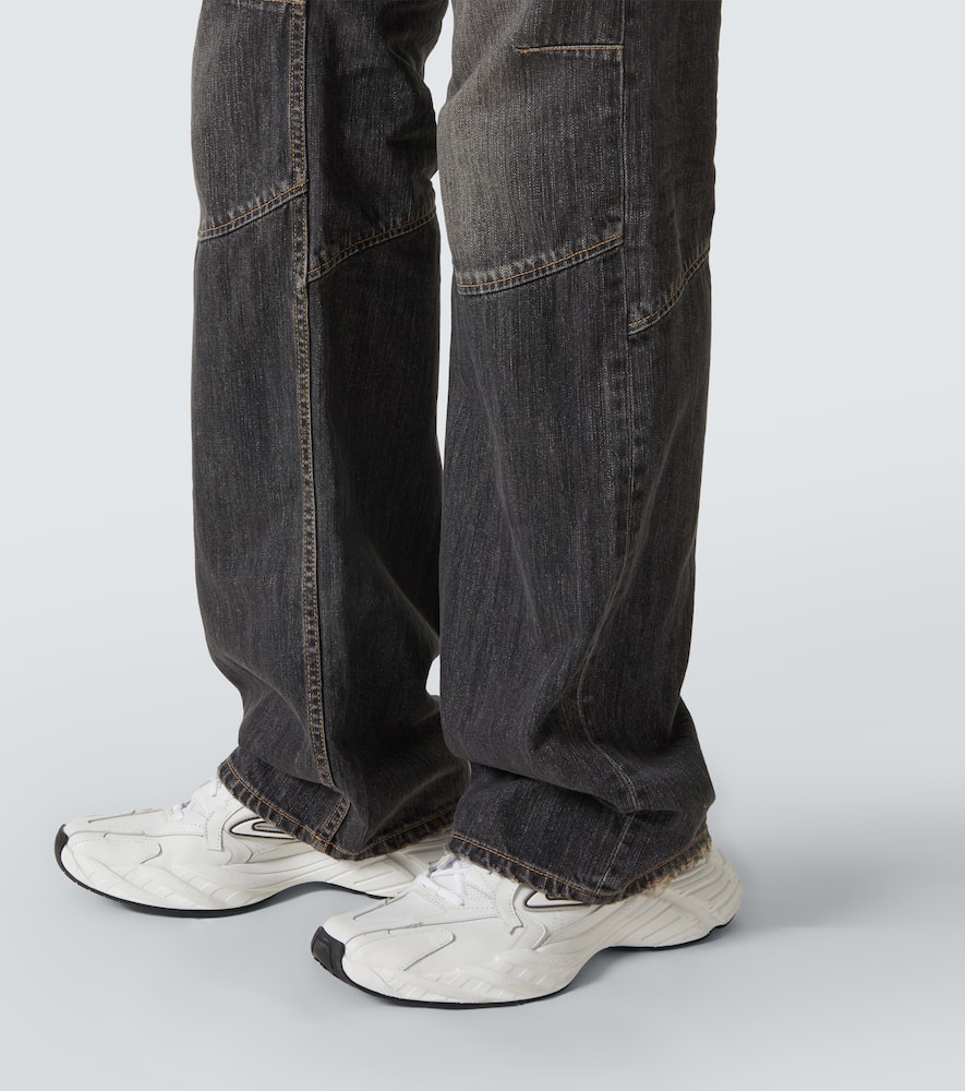 Balenciaga Distressed low-rise wide-leg jeans