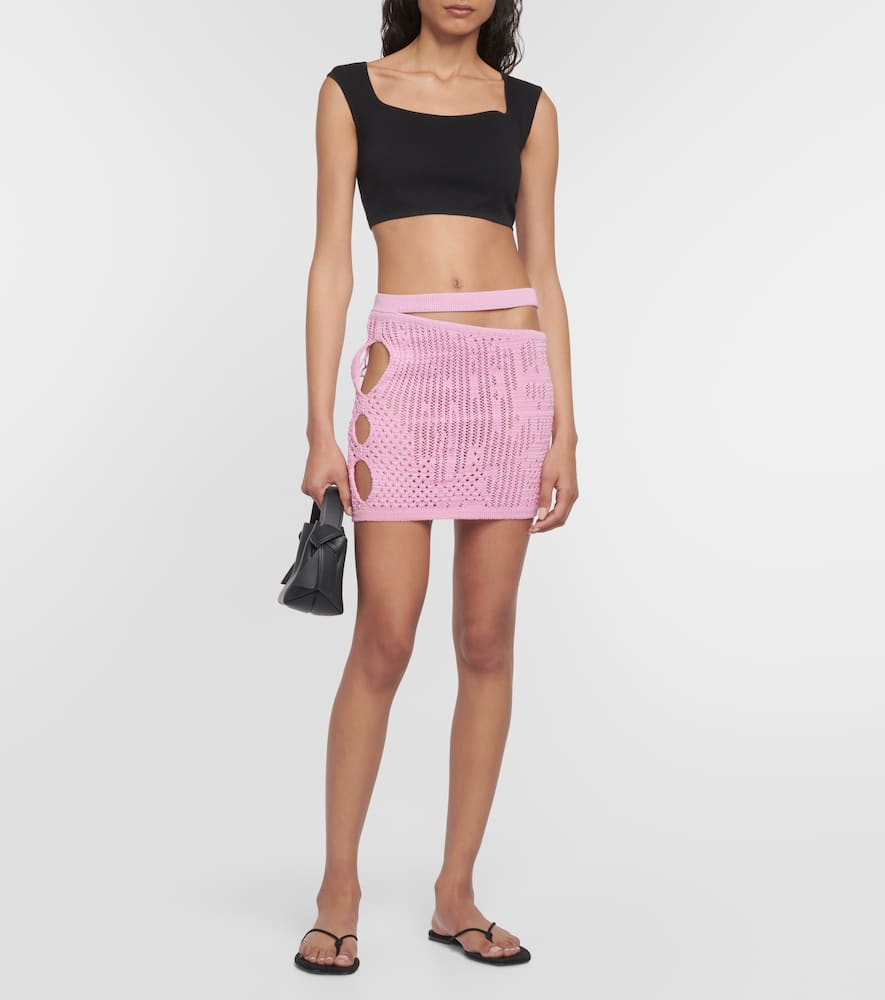 Distressed cutout cotton-blend miniskirt