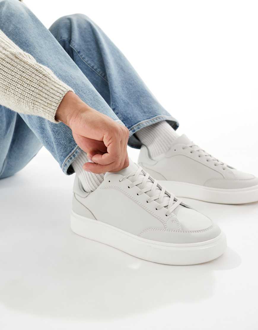 Lace up trainers in grey with white sole