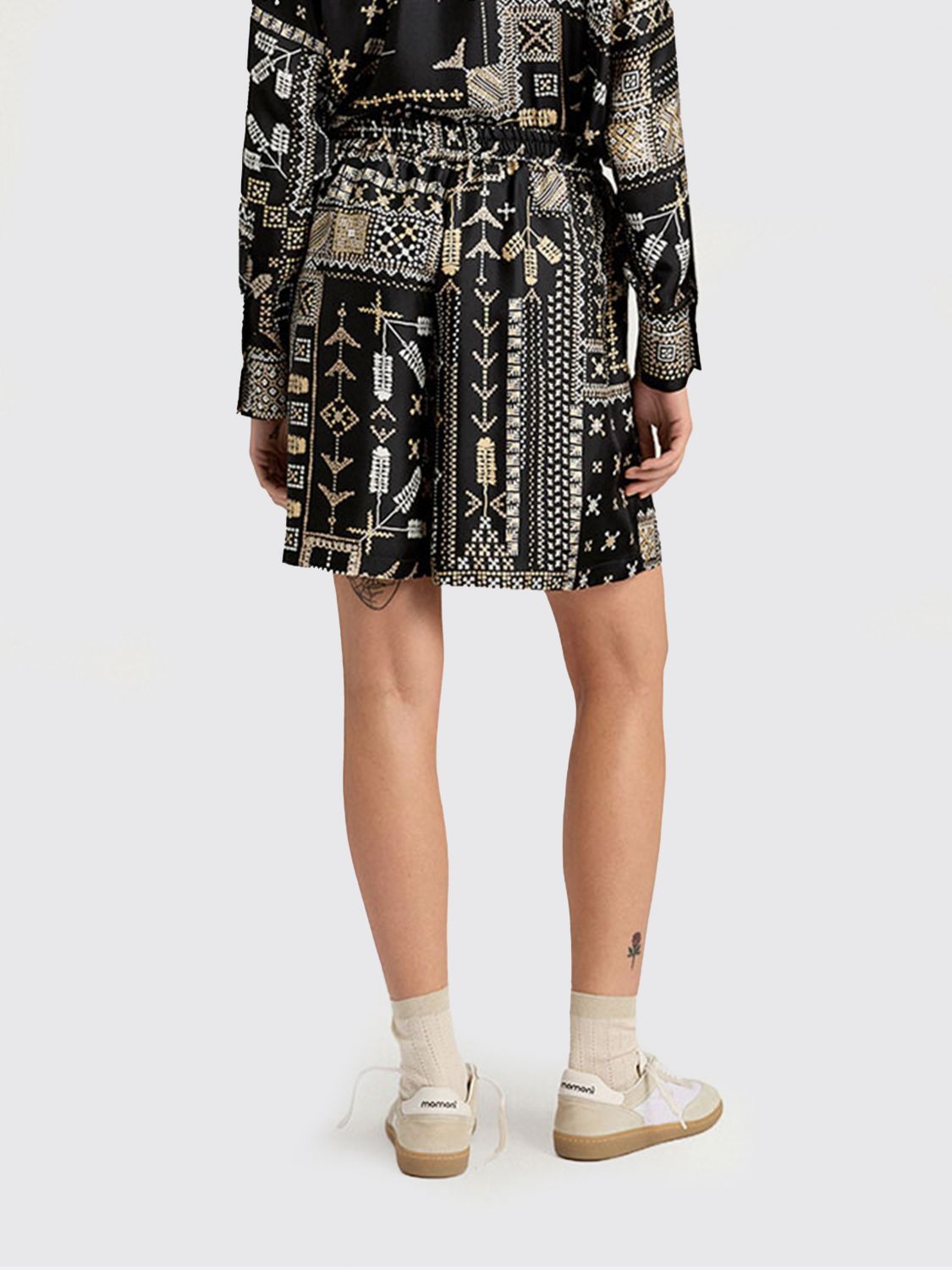 MOMONÌ Shorts Woman color Black