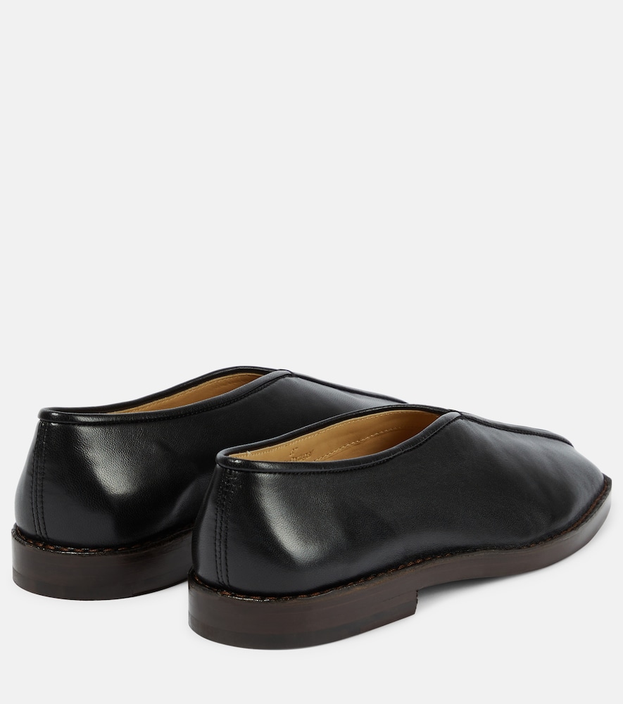 Piped leather loafers