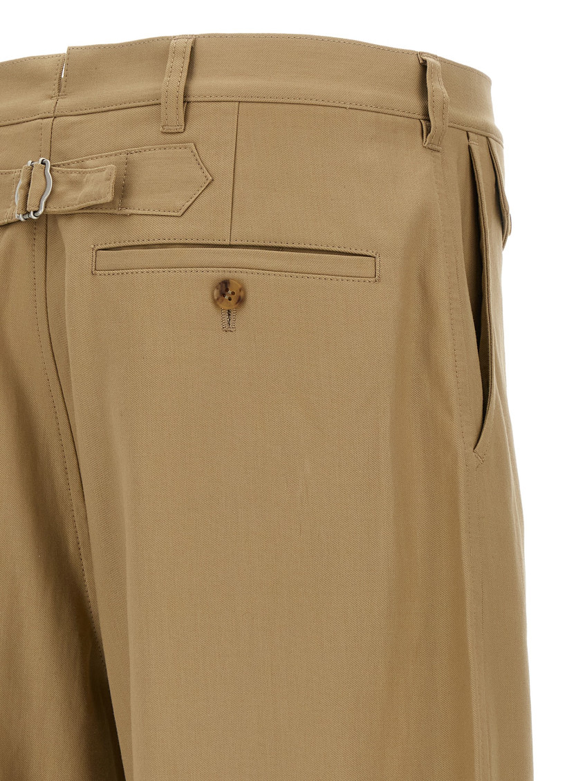 Beige Curved leg pants