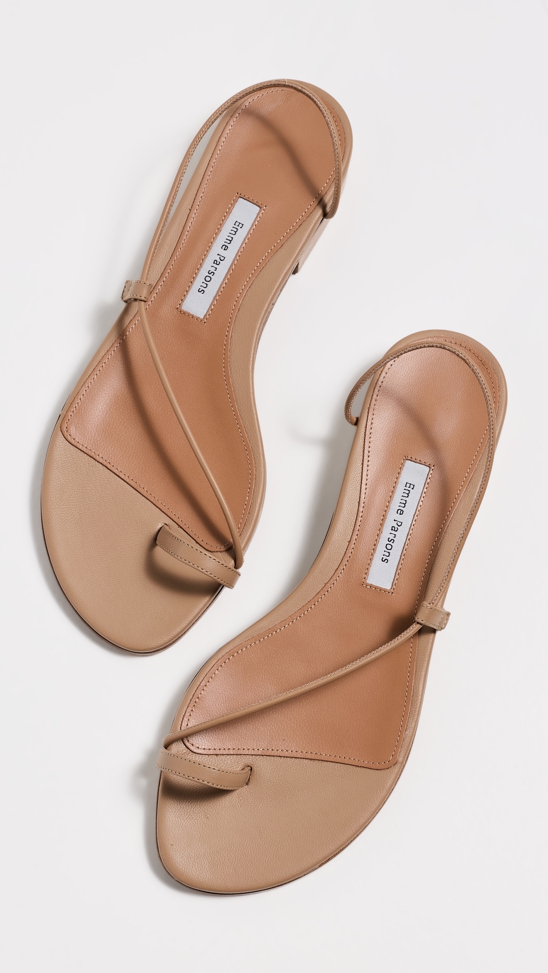 Susan Slides Tan