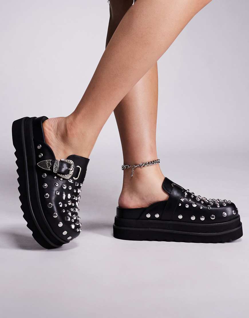 Gabir studded clogs in black faux leather