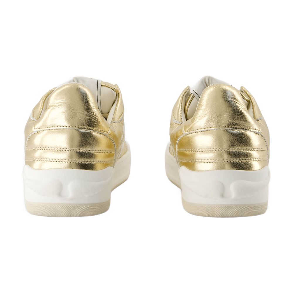 Sneaker — Gold