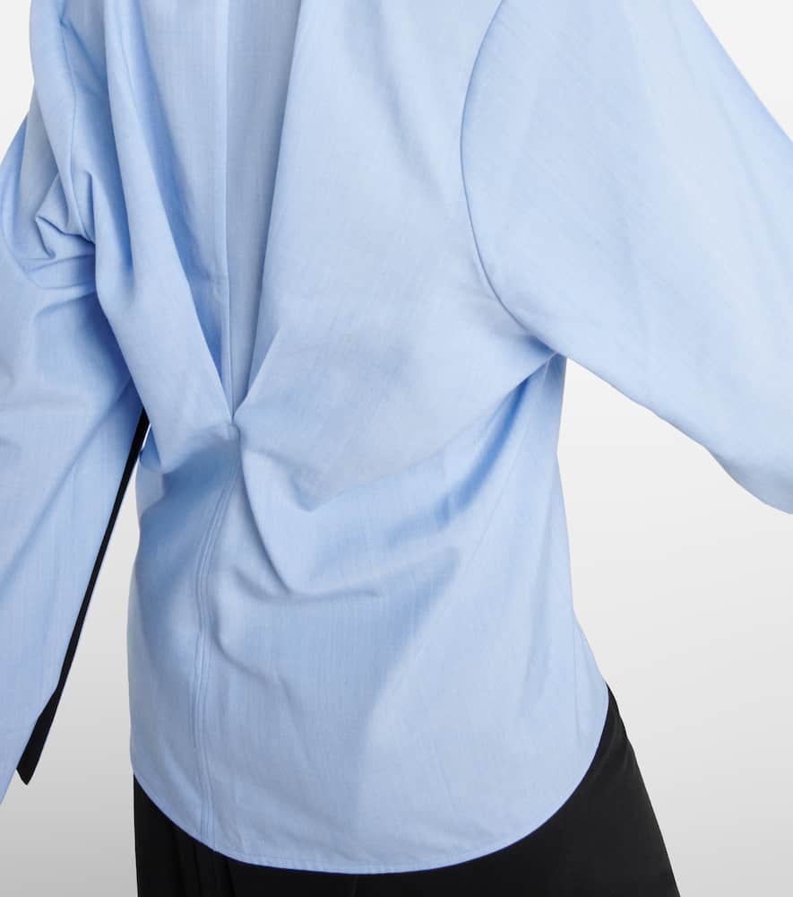 Caped virgin wool blouse