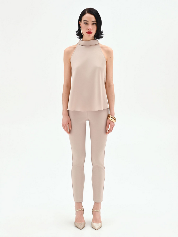 Top handed woman turtleneck beige