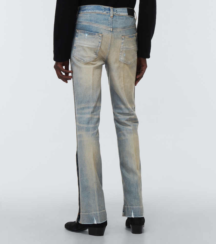 Distressed embellished denim jeans