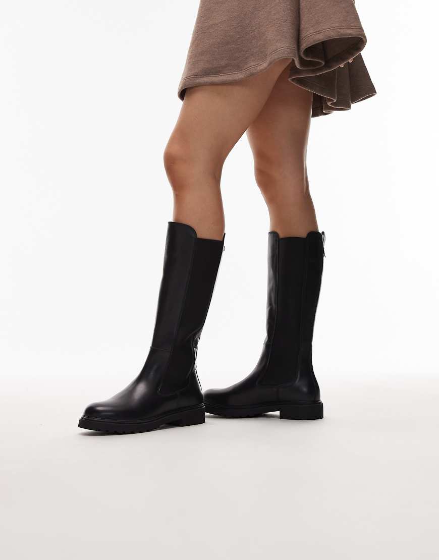 Long flat leather boots in black