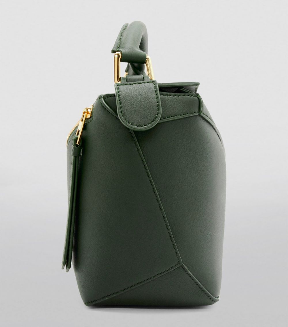 Small Leather Puzzle Edge Top-Handle Bag