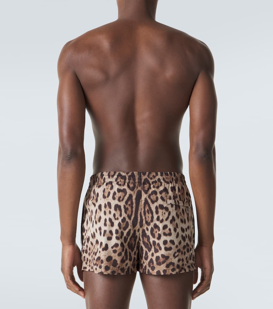 Leopard-print swim trunks