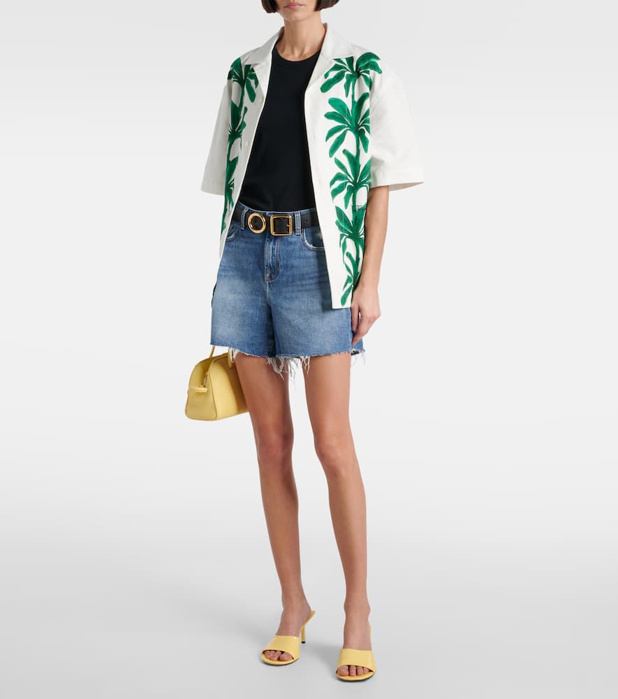 Distressed mid-rise denim shorts