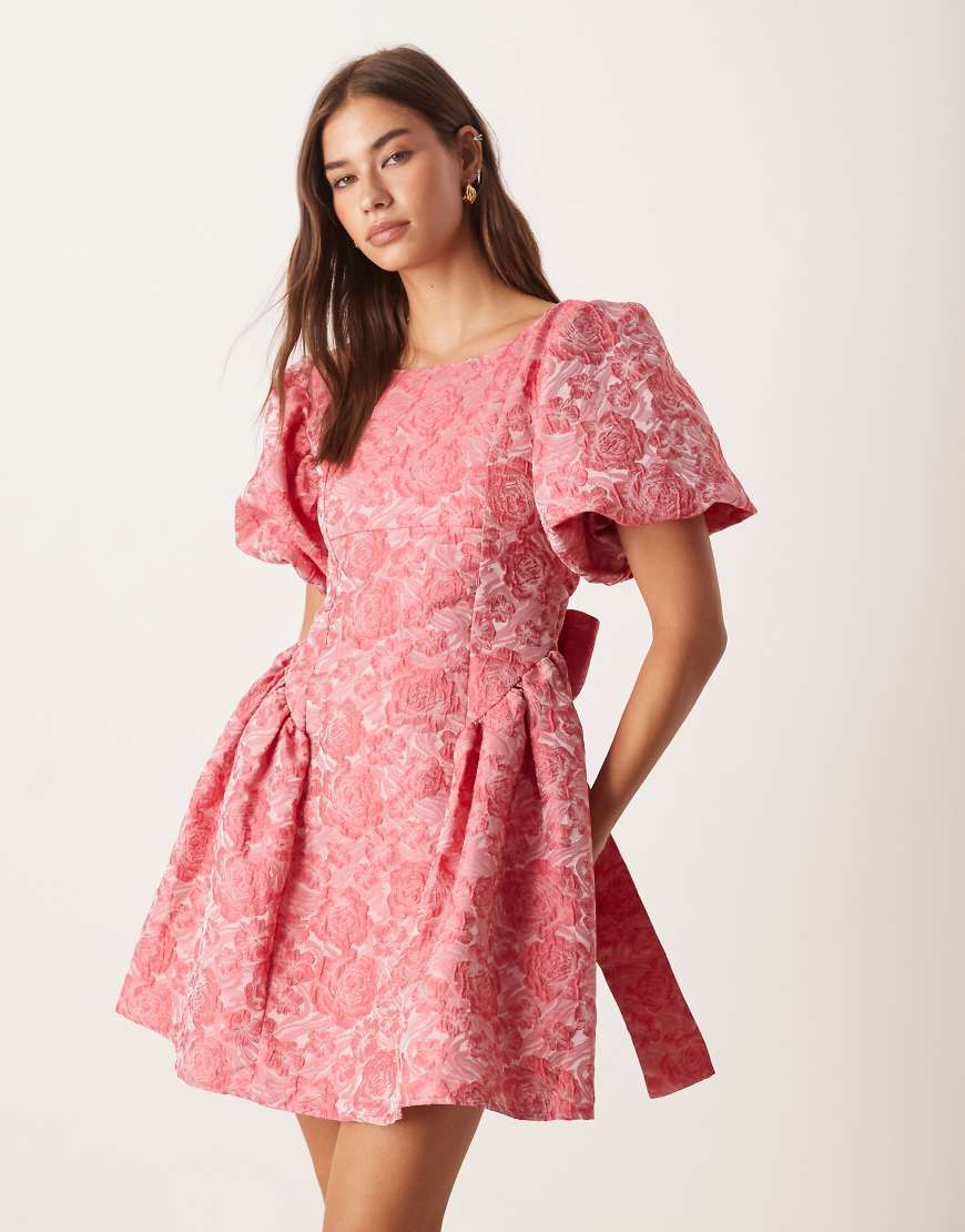 Dream bow back cinched jacquard mini dress in pink floral