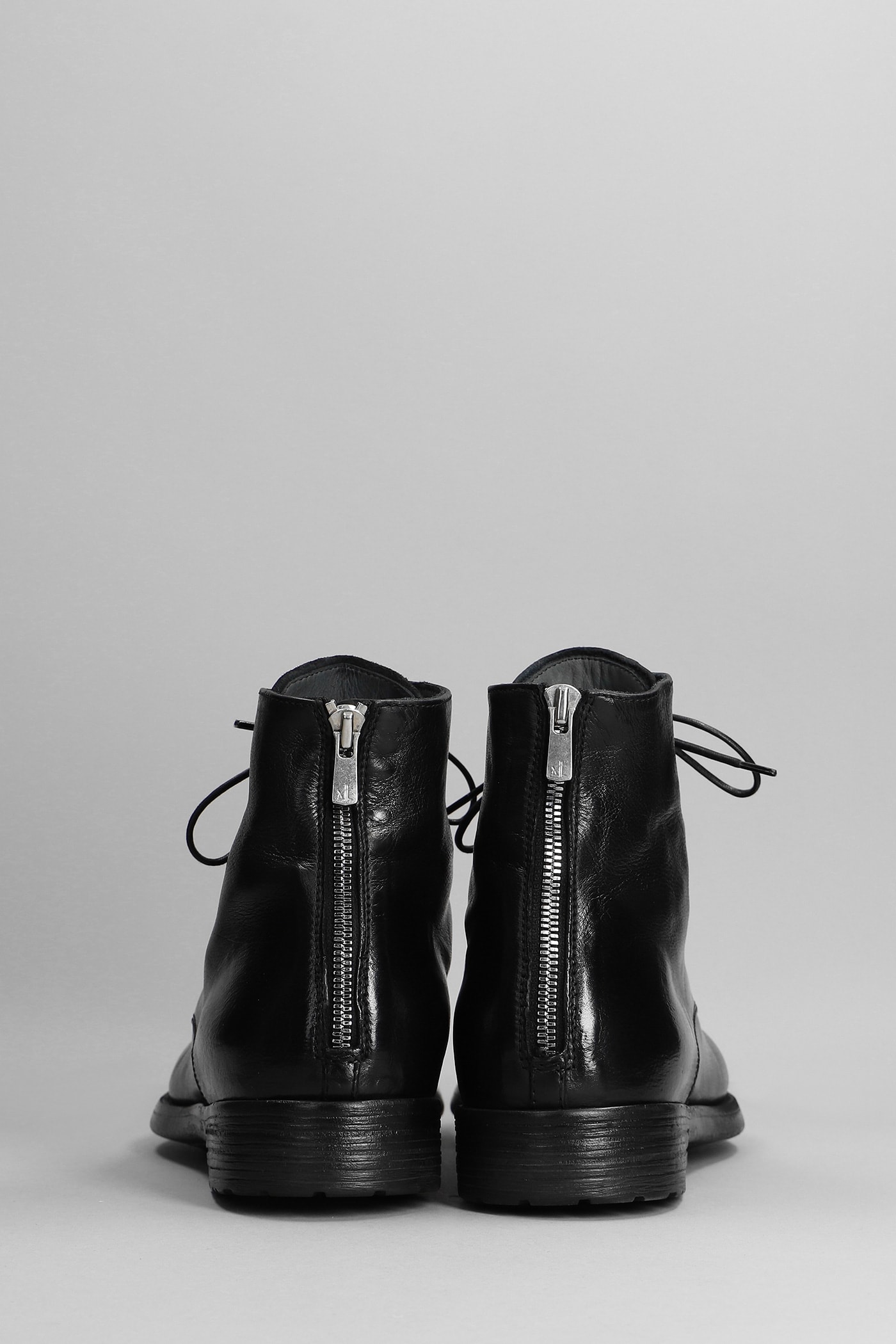 Flat lace-up boots