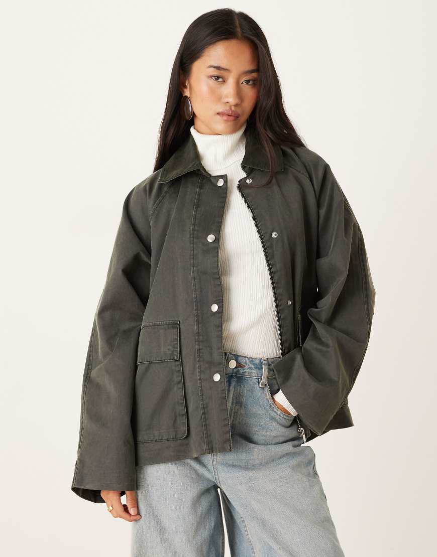 Quilted oversize corduroy jacket in dark khaki green with contrast cord collar