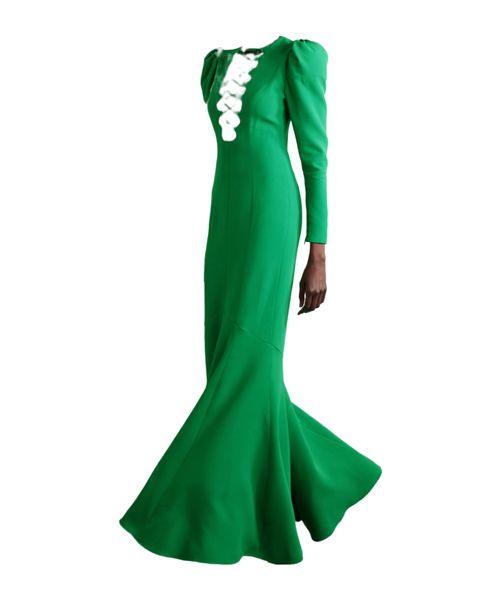 A crepe dress decorated with crystal straps