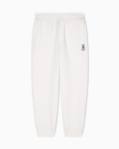 Jogger pants with metal logo