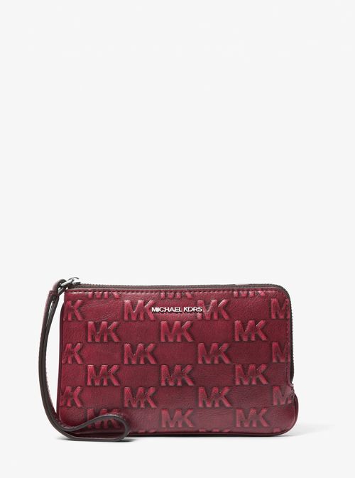 Jet Set Travel Small Burnished Logo Embossed Wristlet in Red - One Size