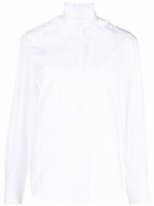 White ruffled shirt