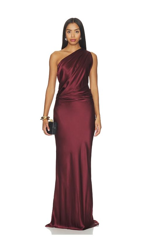The Sei Draped One Shoulder Gown in Burgundy. 0. Also