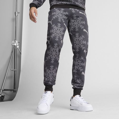 PUMA ESS+ Logo Lab Winter Snowflake Sweatpants in Black