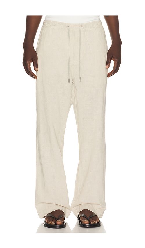 Far Afield House Trouser in Beige. S. Also in