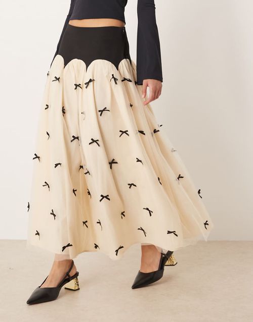 Contrast bow drop hem maxi skirt in black and cream