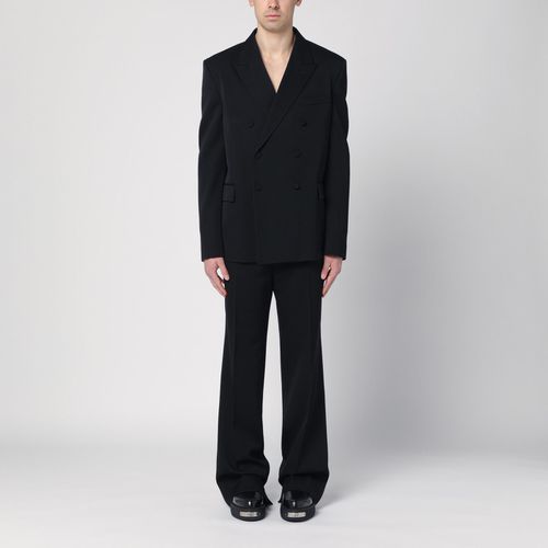 Black double-breasted wool suit