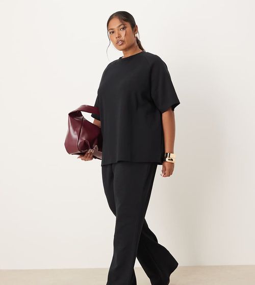 ASOS DESIGN Curve interlock flared sweatpants in black - part of a set