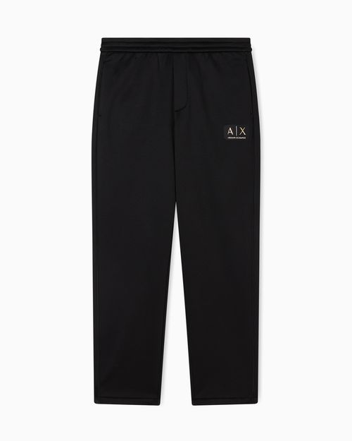 Jogger pants with metal logo
