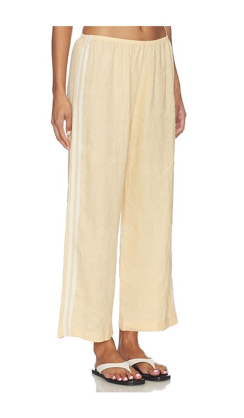 DONNI. The Linen Crop Racer Stripe Pant in Yellow. - M also in