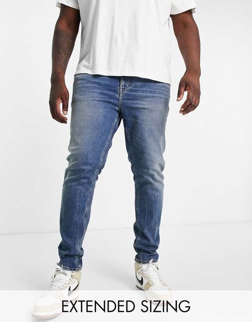 Skinny jeans in blue wash with heavy tint