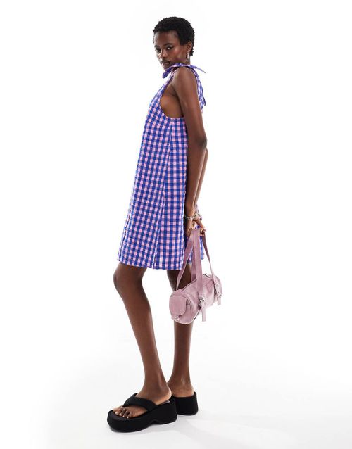 Monki seersucker bow tie strap mini dress in pink and blue gingham-Multi