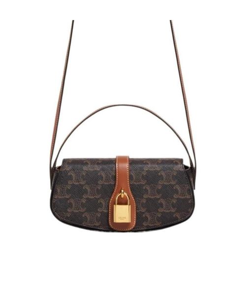 CLUTCH ON STRAP TABOU in Triomphe canvas and calfskin