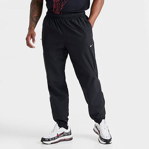 Men's NOCTA Northstar Nylon Track Pants in Black/White